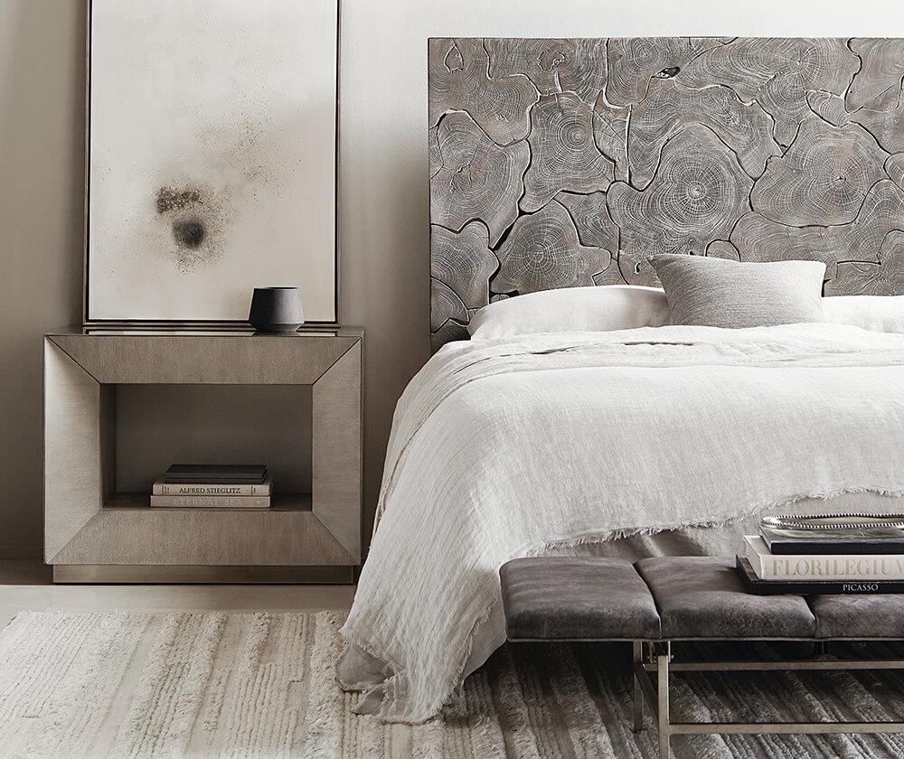 Slices of natural teak form the headboard of a stunning Bernhardt bed. 